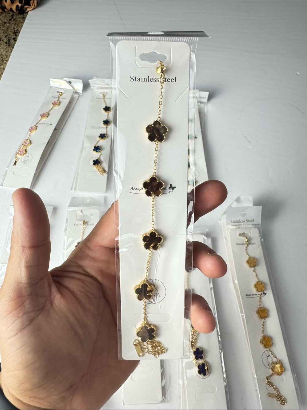 Gold Flower Charm Bracelet with Brown Accents